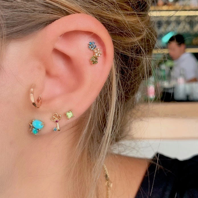 Clave con diamantes de 14 quilates