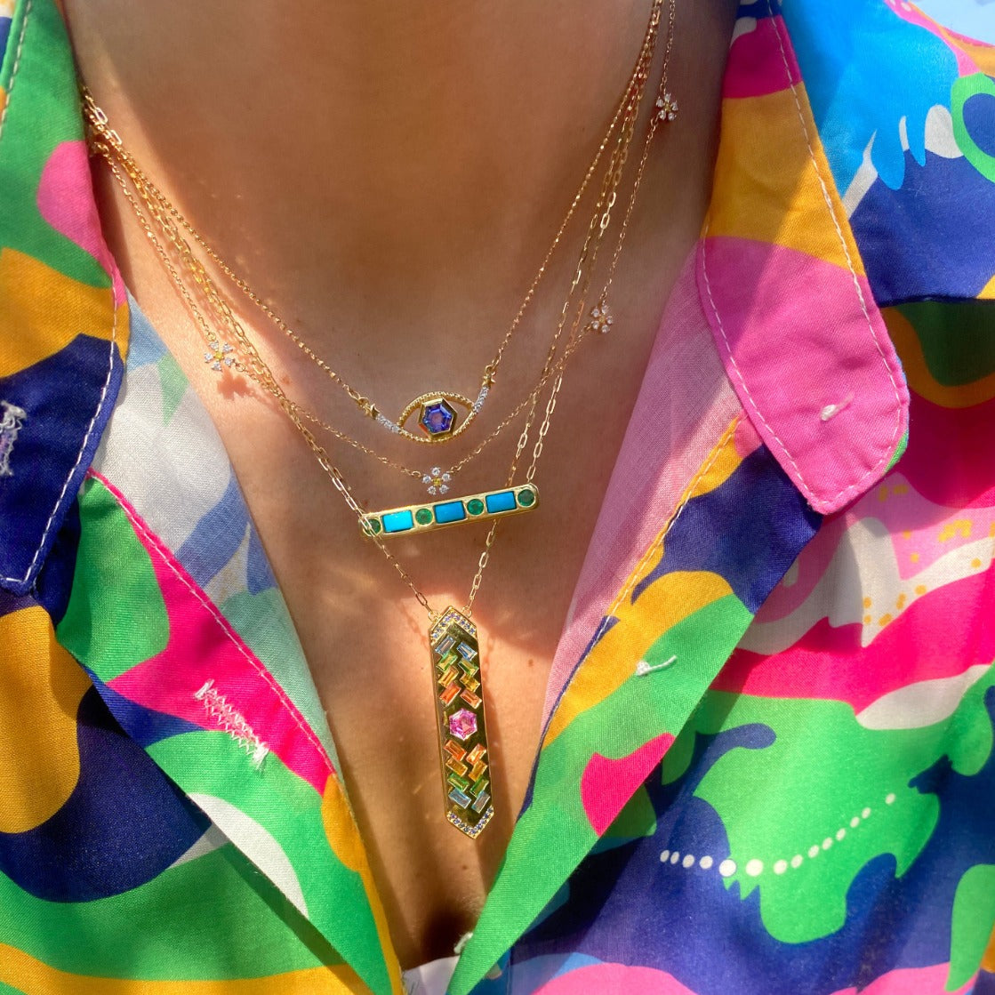 Collar con talismán de piedras preciosas de 18 quilates de The Guardian