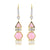 Pendientes colgantes con piedras preciosas en forma de panal de 18 quilates de The Dreamer